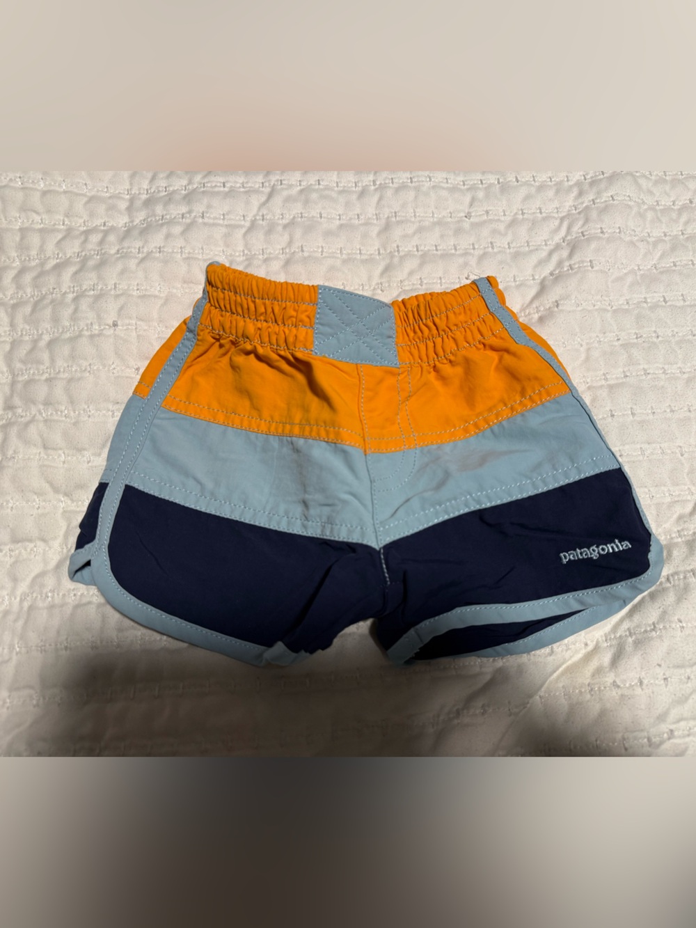 Patagonia Kids Colorblock swim Shorts in Navy, Light Blue & Orange